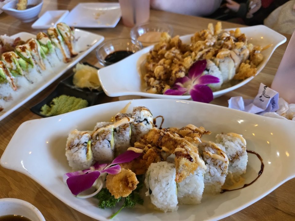 Sushi rolls arranged on a restaurant plate